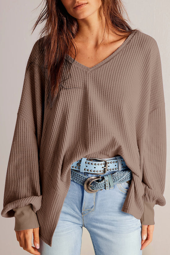 Long -sleeved loose blouse and V -winged V -neck collar