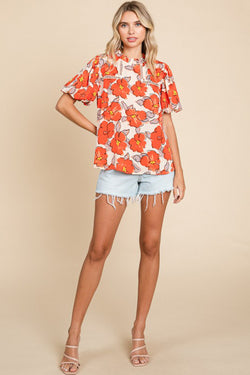 Orange loose sleeve blouse and flying collar and floral pattern