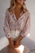 V -neck pink shirt and bishop sleeves with floral print