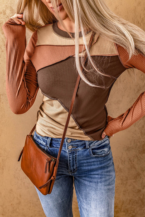 Brown ribbed knit top with exposed seams and color blocking