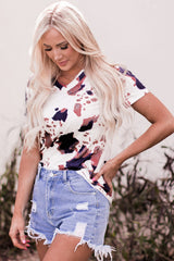 White T-shirt with short sleeves and V-neck printed with cow pattern