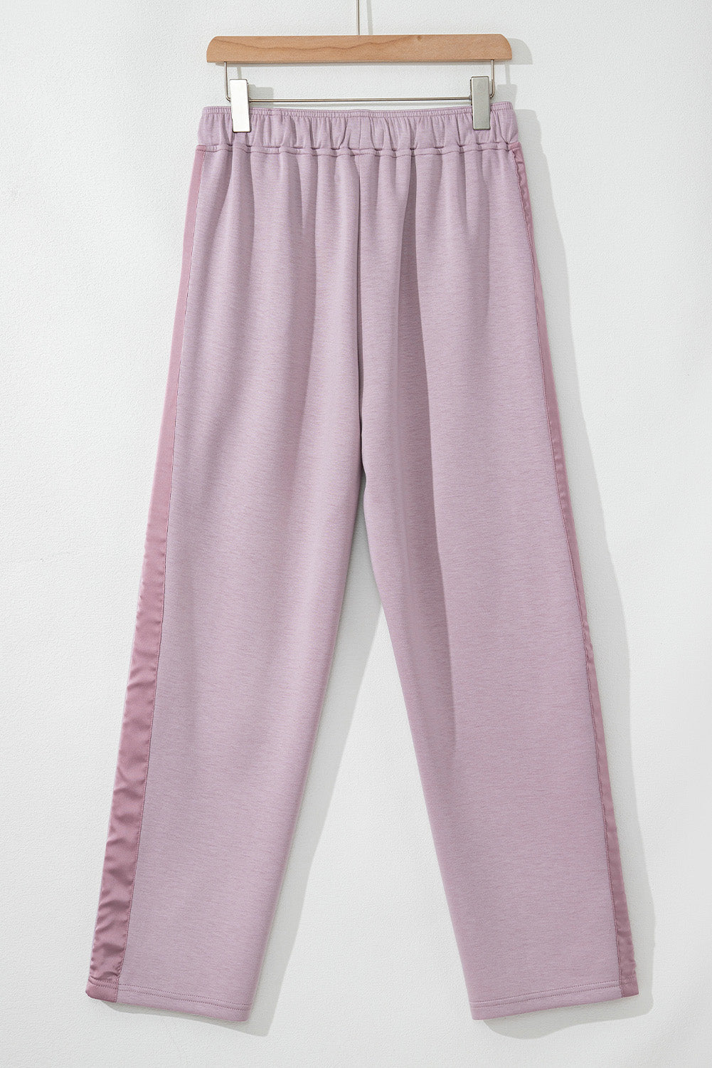 High waist pants with tightening cord and orchid petals, satin striped patch, right leg
