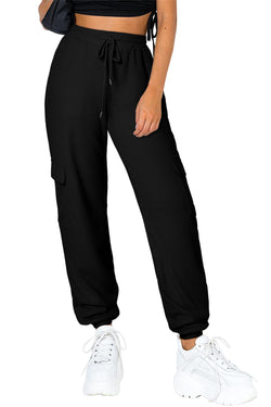 Pantalones de trote negros con bolsillo de carga y textura en relieve