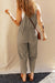 Sage green short overalls with buttoned straps and drawstring