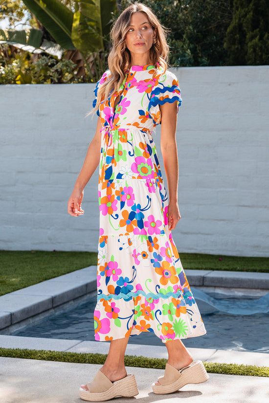 Long floral dress buttoned with floating sleeves and ricrac pink border