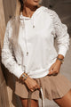 White hooded sweatshirt with tightening cord *