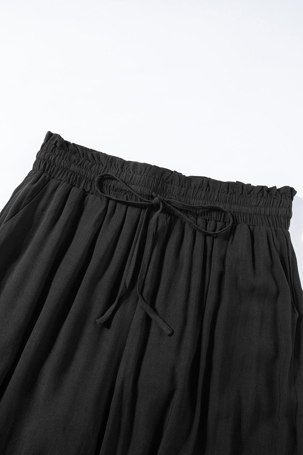 Pantalones anchos de cintura alta con cordón negro