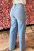 Jean jambe large taille haute bleu clair à décor floral strass