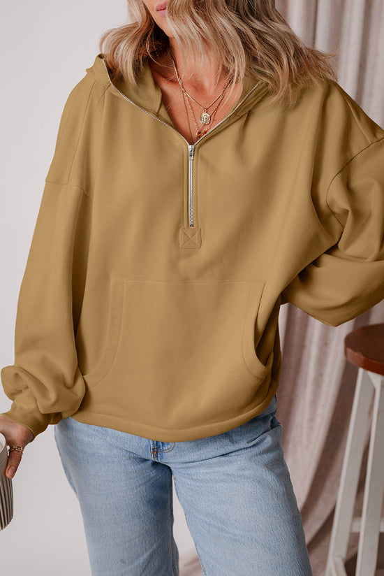 Brown loose hoodie with kangaroo pockets and half-zip lined with fleece