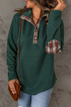 Green sweatshirt with geometric texture and plaid border