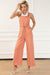 Orange wide leg overalls with pockets and drawstring