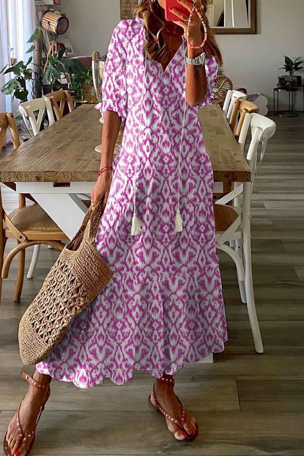 Long relaxed dress with geometric print and pink v collar