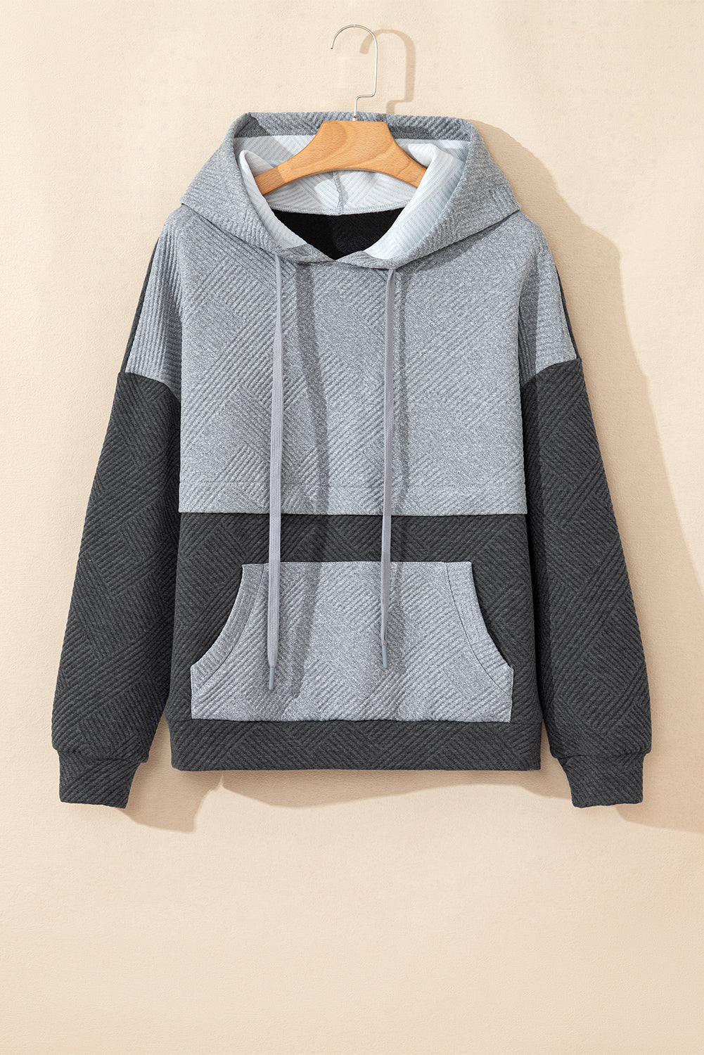 Grey textured hoodie with kangaroo pocket and dropped shoulders