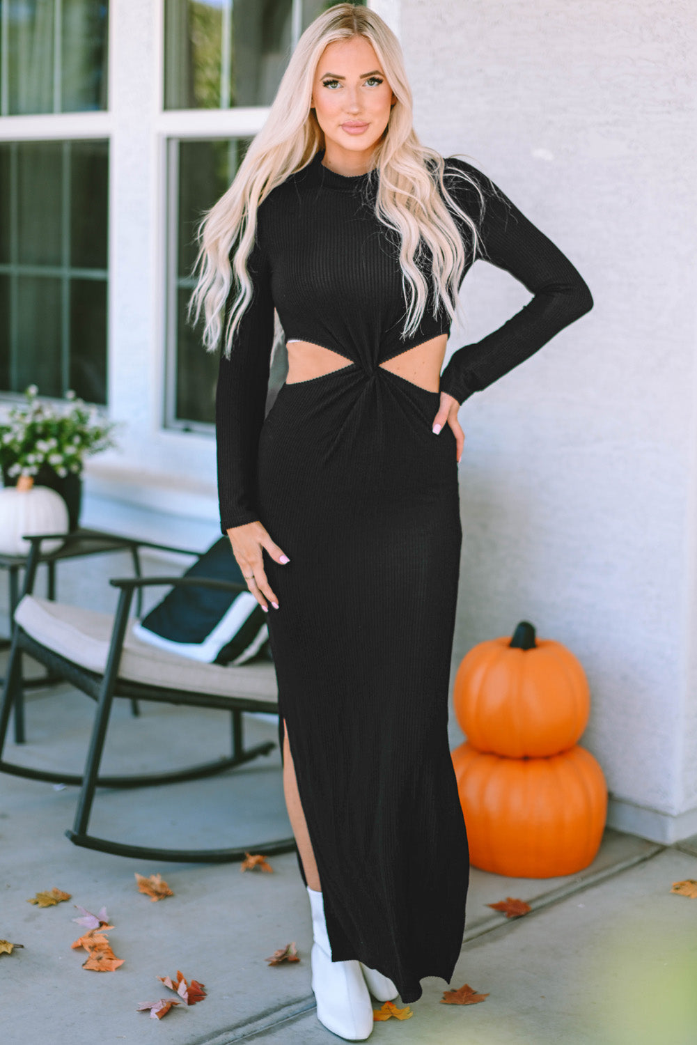 Black ribbed dress with long sleeves and twisted cutout