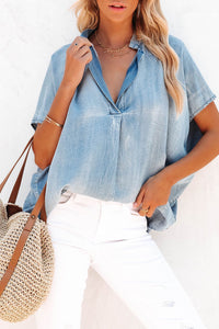 Over-dimensioned denim blouse *