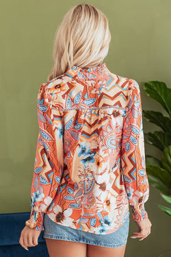 Large shirt buttoned with frowned and orange floral print