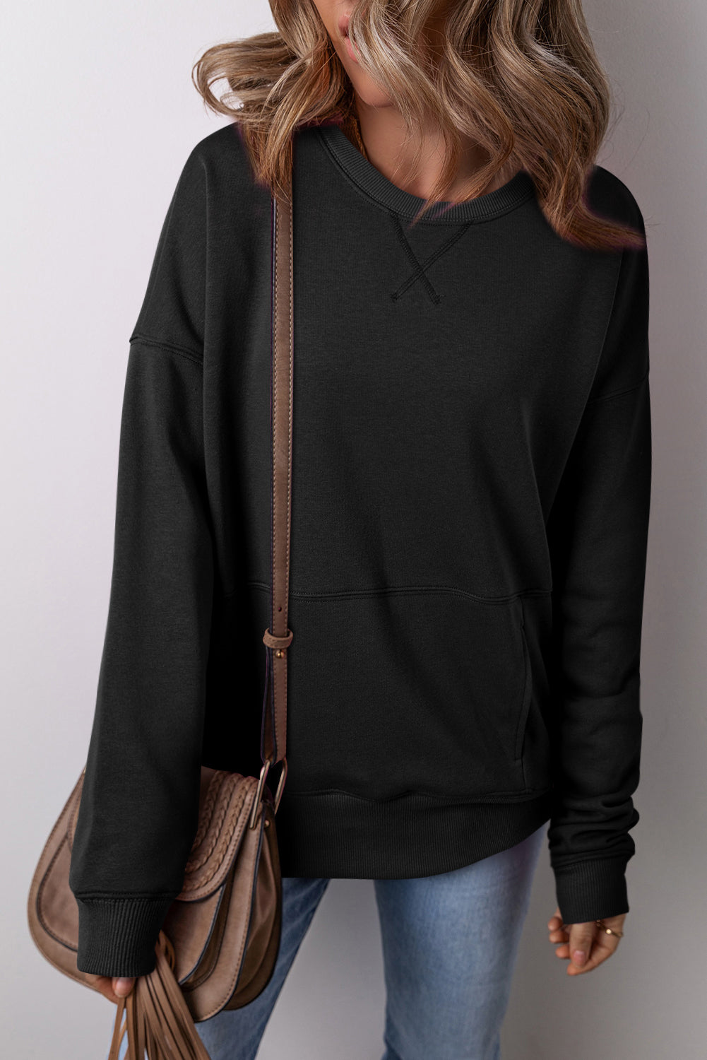 Black loose sweatshirt with pockets and dropped shoulder cross seams