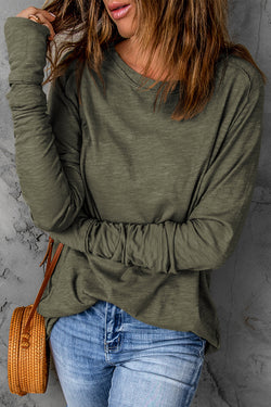 Solid green top with long sleeves and round neck