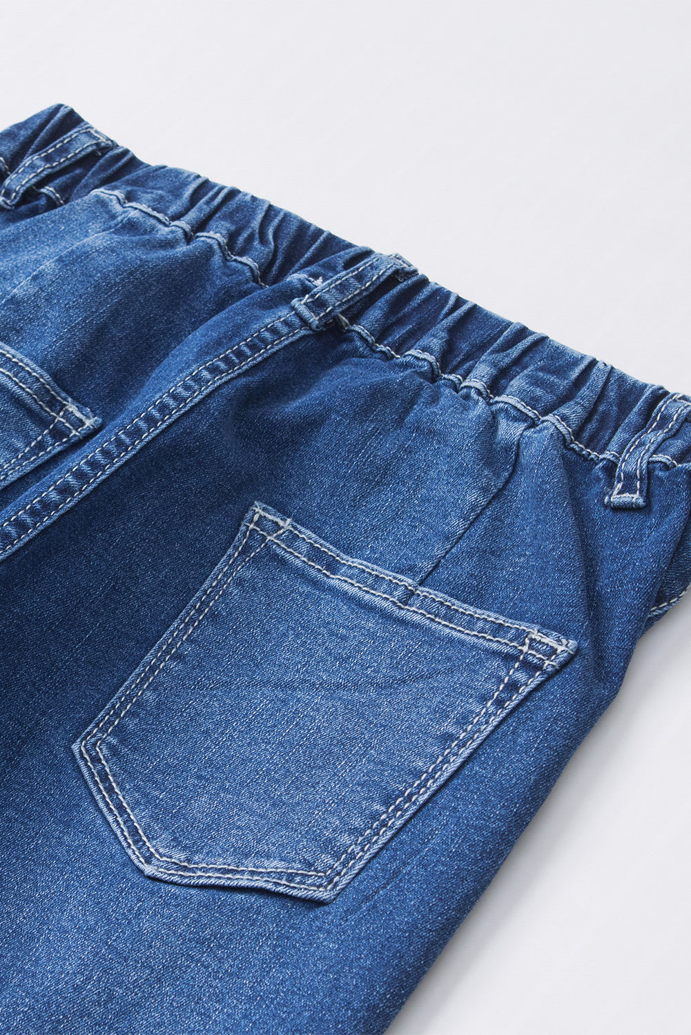 Jeans a bagliore a vita alta elastica blu