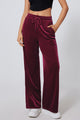 Large burgundy pants with size with tightening cord