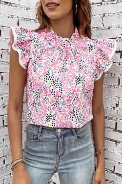 Top rosa con mangas flotantes y collar vertical con estampado abstracto multicolor