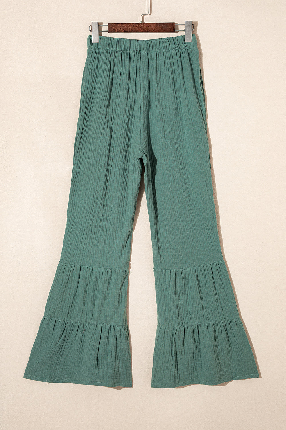 Pantalones de campana con volantes y cintura alta con textura verde