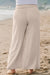 Pantalon large taille haute smocké beige grande taille