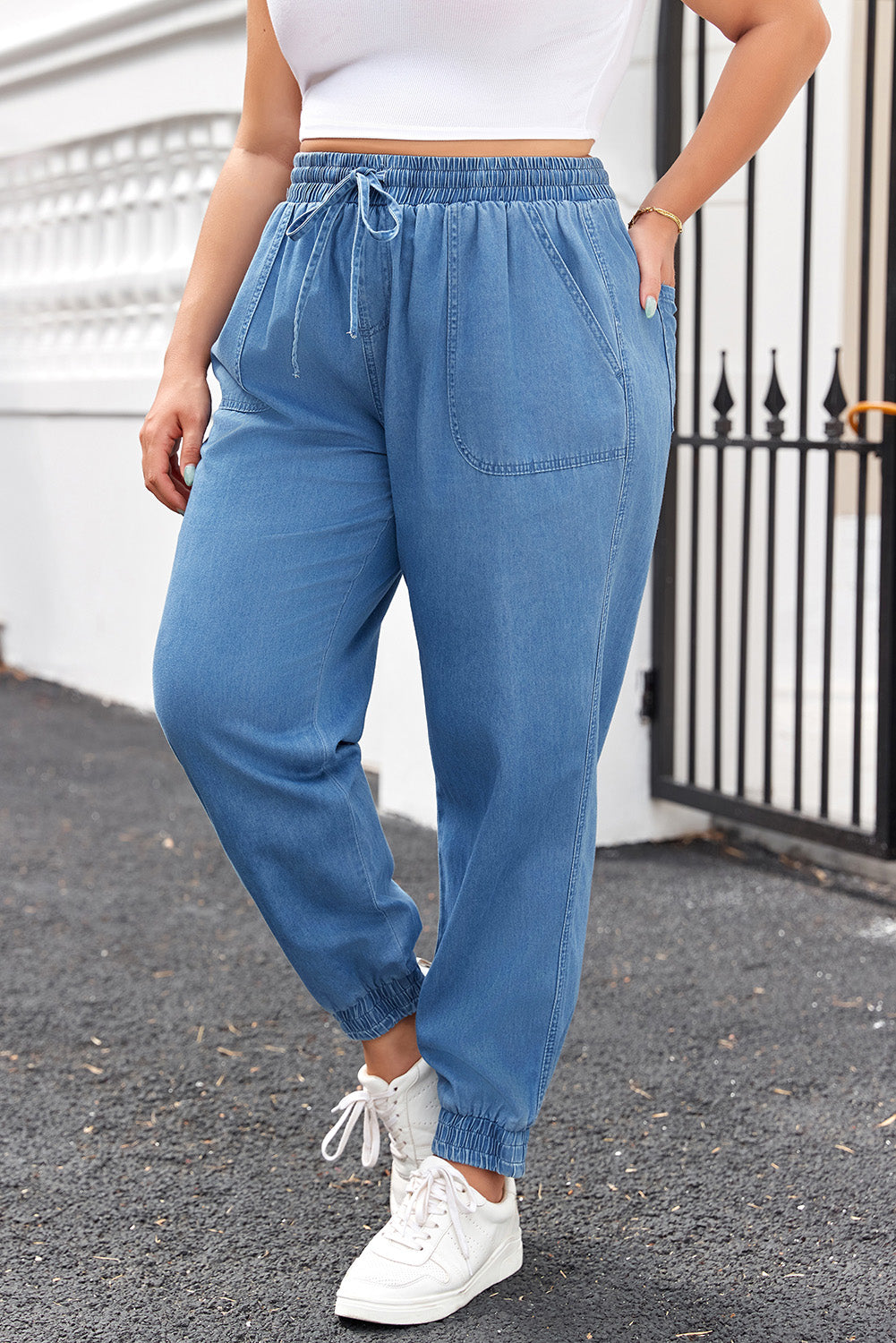 Dusk Blue Denim Jogger Pants with Waist Pockets and Oversized Drawstring