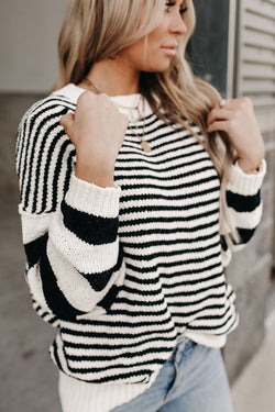 Black and white striped bishop sleeve drop shoulder knit sweater