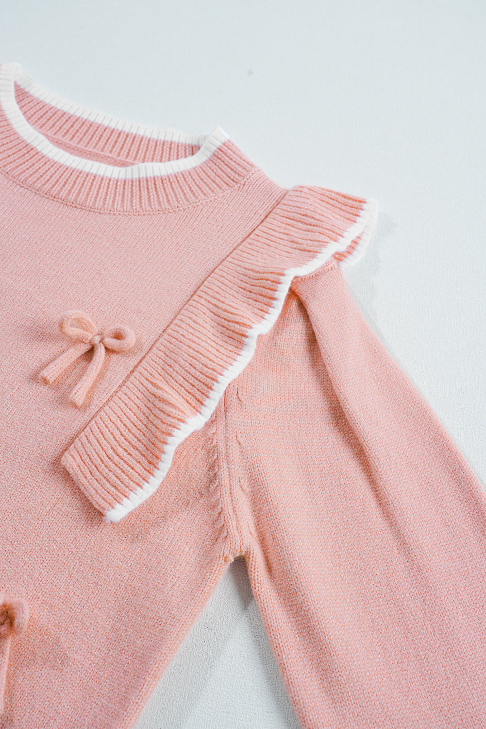 Light Pink Long Sleeve Ribbed Trim Sweater with Bow Tie and Ruffles