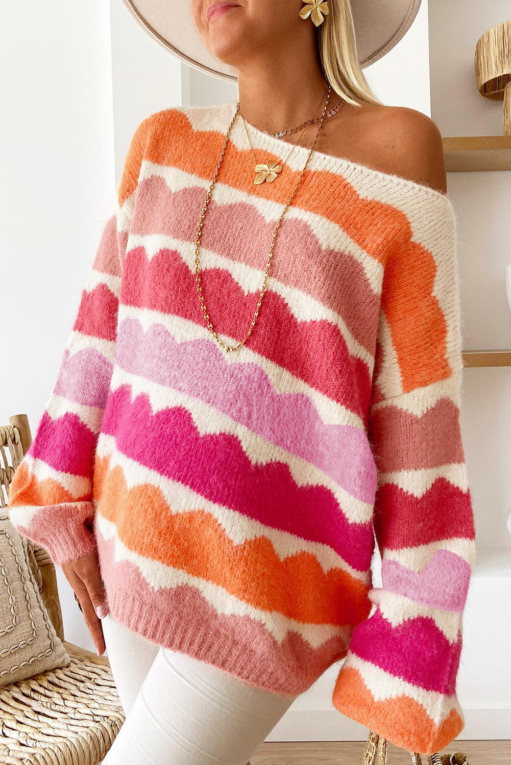 Pink red striped sweater with balloon sleeves and dropped shoulders