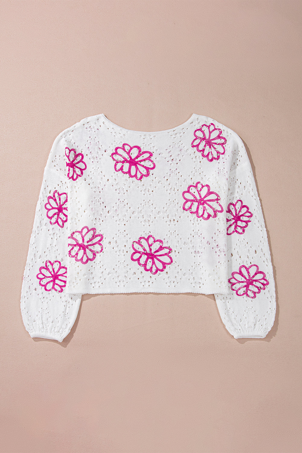 White drop shoulder sweater with contrast floral print eyelets