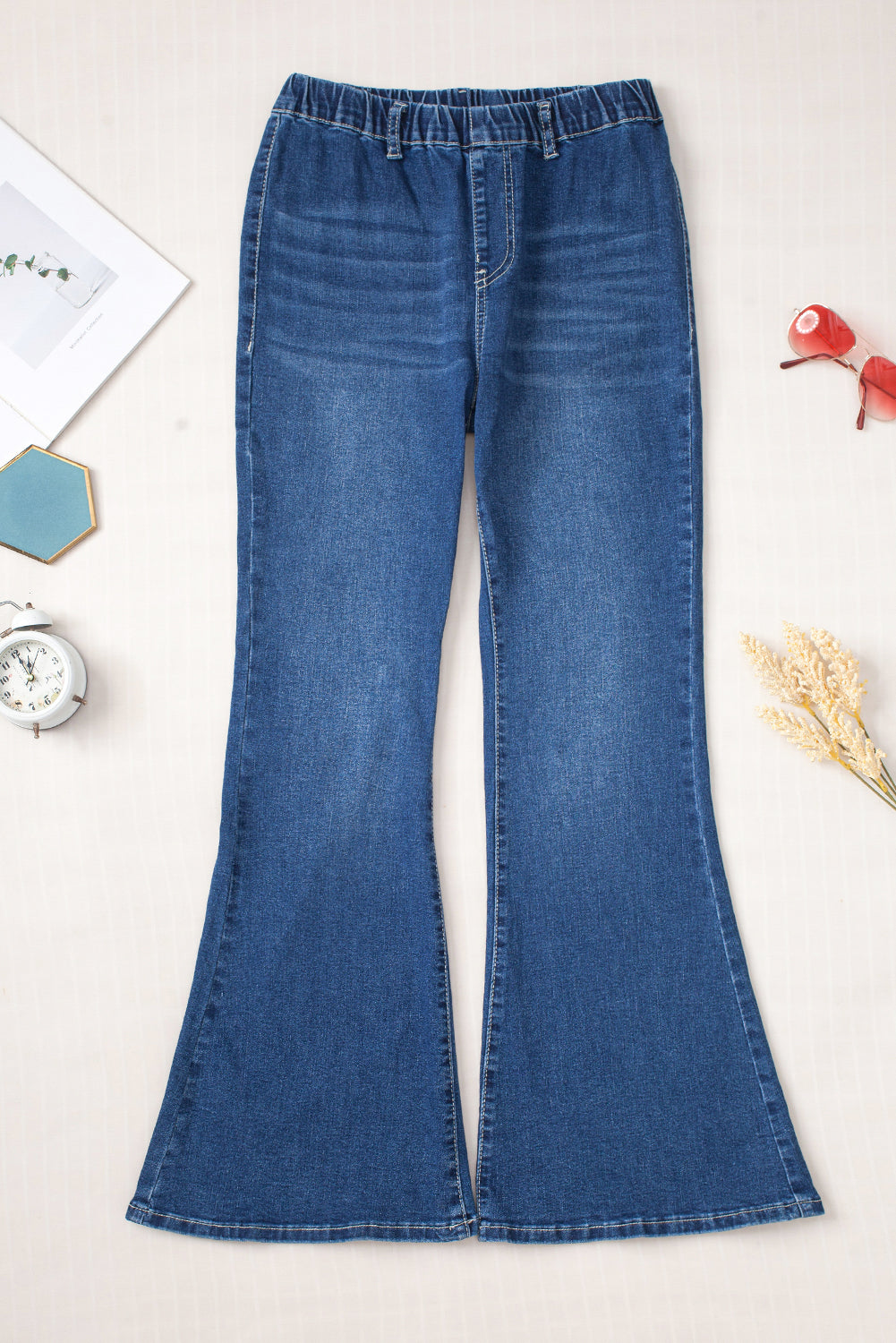 Jeans a bagliore a vita alta elastica blu