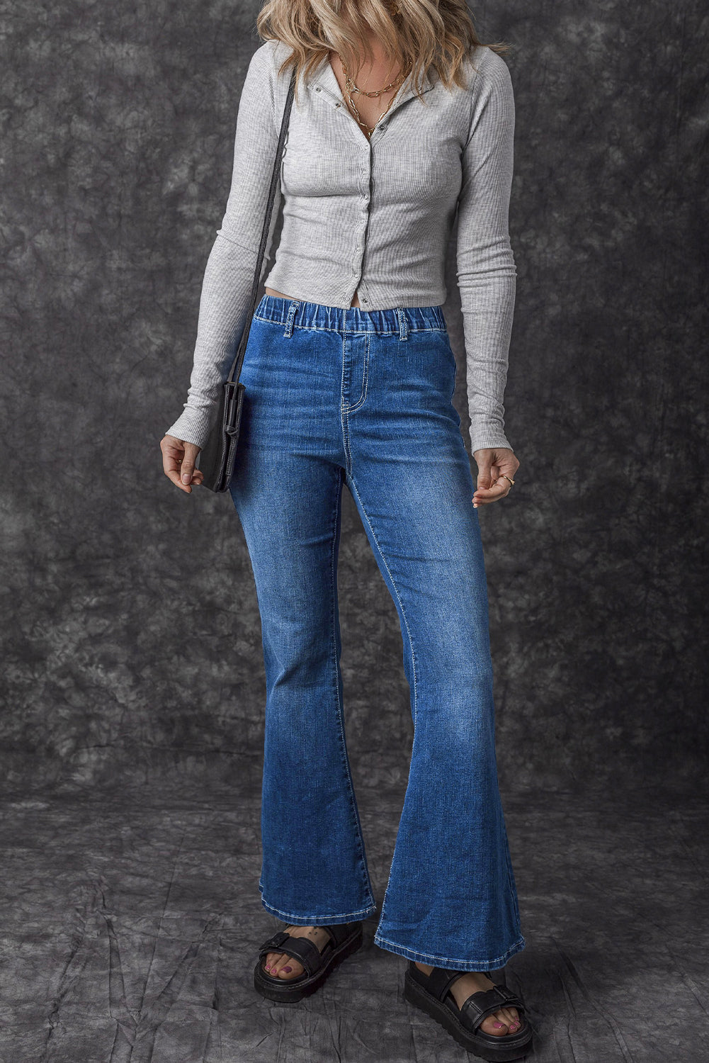 Jeans a bagliore a vita alta elastica blu