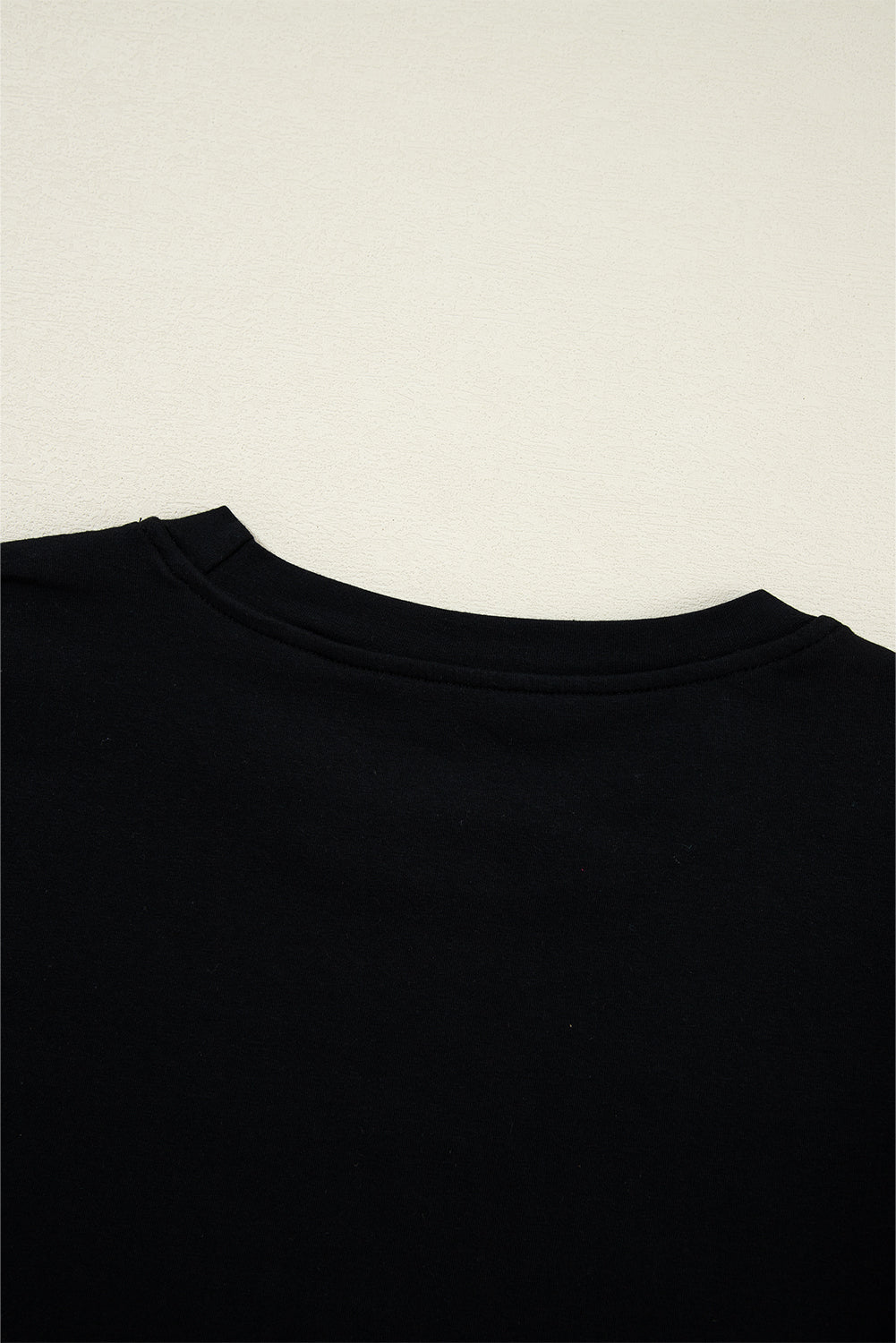 Blouse noire à manches volantées en tulle-A WOMAN WE LOVE