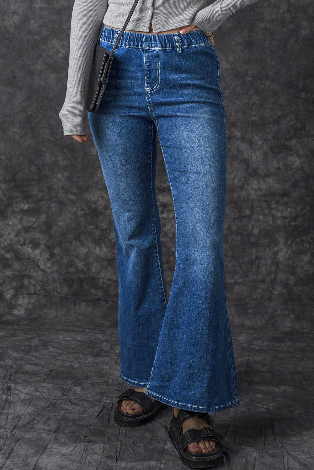 Jeans a bagliore a vita alta elastica blu