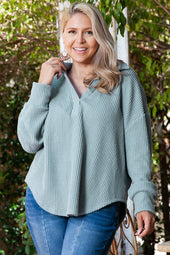 Beautiful Blue - High textured folded down to V -neck and drooping shoulders of large size