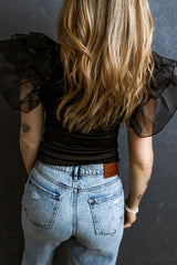 Côte ribbed mesh with floating sleeves in black mesh
