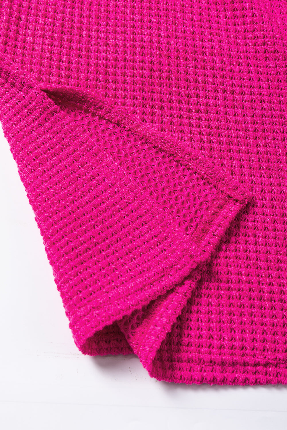 Top dividido de manga larga con costura central texturizada en rojo rosa