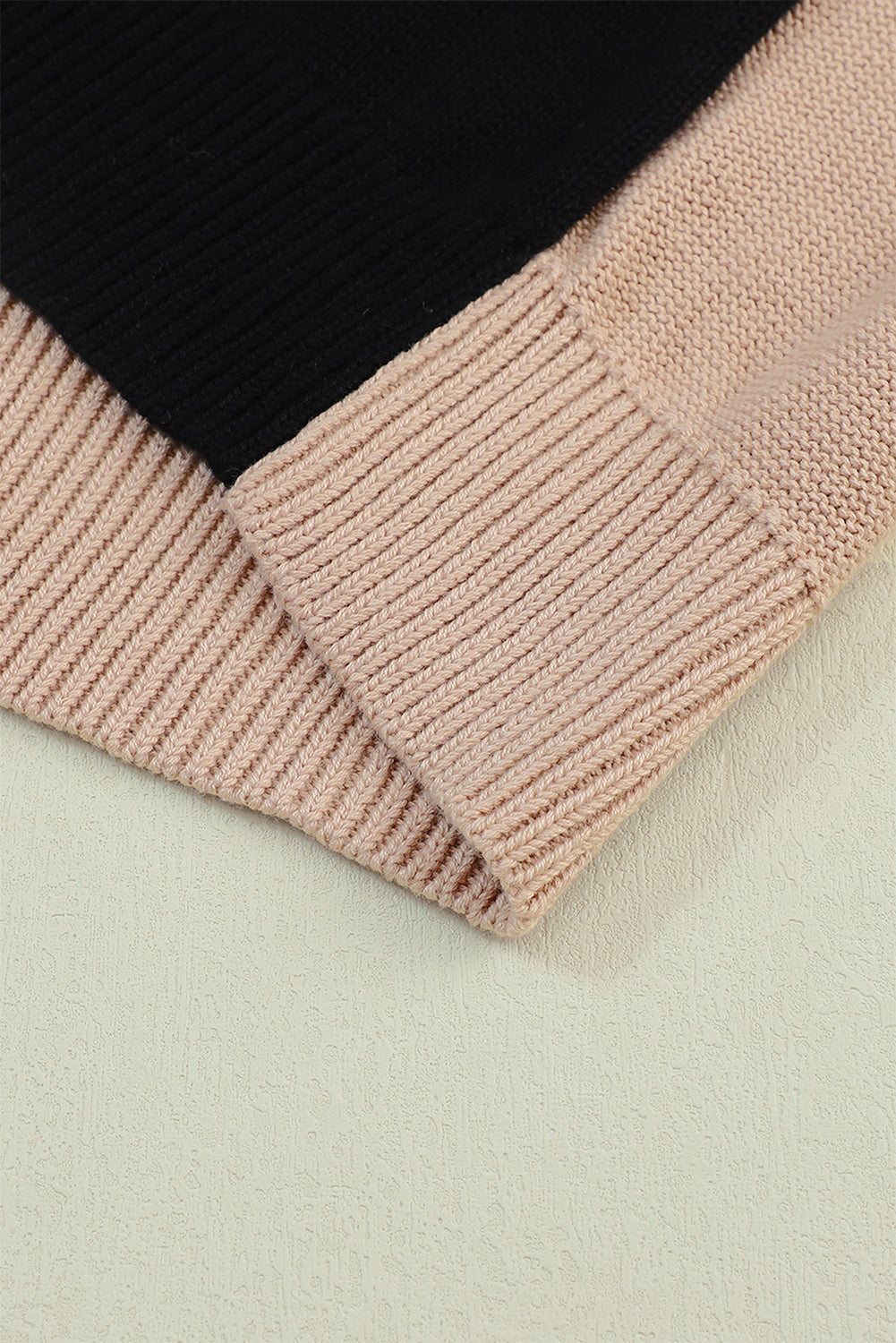 Black sweater with ribbed edge and COLOR BLOCK bishop sleeves