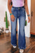 High-waisted, double-button, distressed, raw-hem, sail blue flared jeans