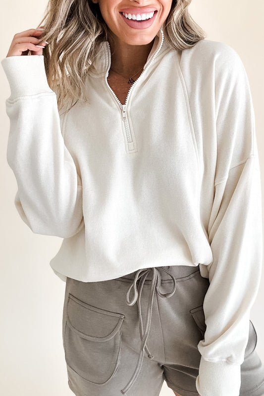 Pullover zippato bianco con zippato goccia per spalla