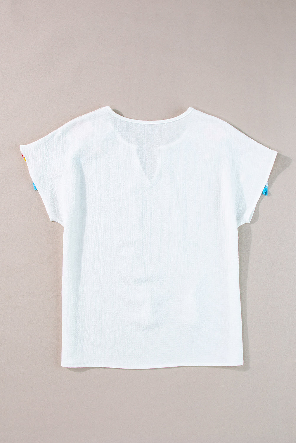 Posche de tejido blanco Poschwork texturizado con franja en V BLUSE