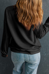 Sudadera negra unida con cuello y hombros caídos, gran tamaño