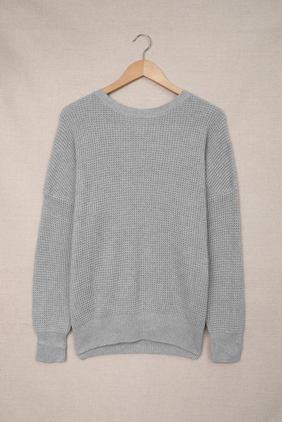 Gray haked sweater in the cross -back