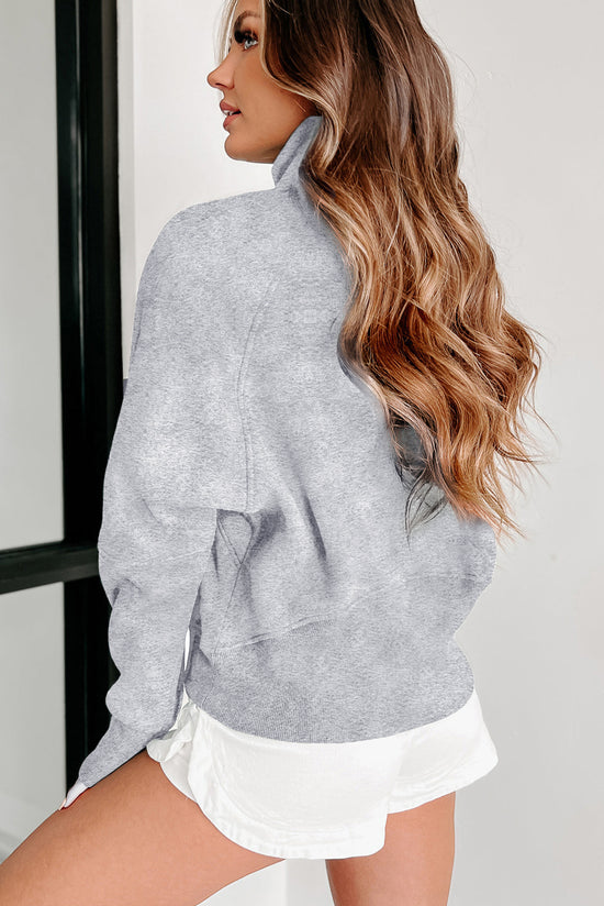 Light gray sweatshirt with stand-up collar and kangaroo pocket with quarter-turn zip