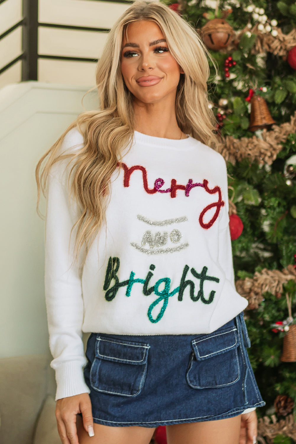 Bright and cheerful graphic Christmas sweater in white garlands