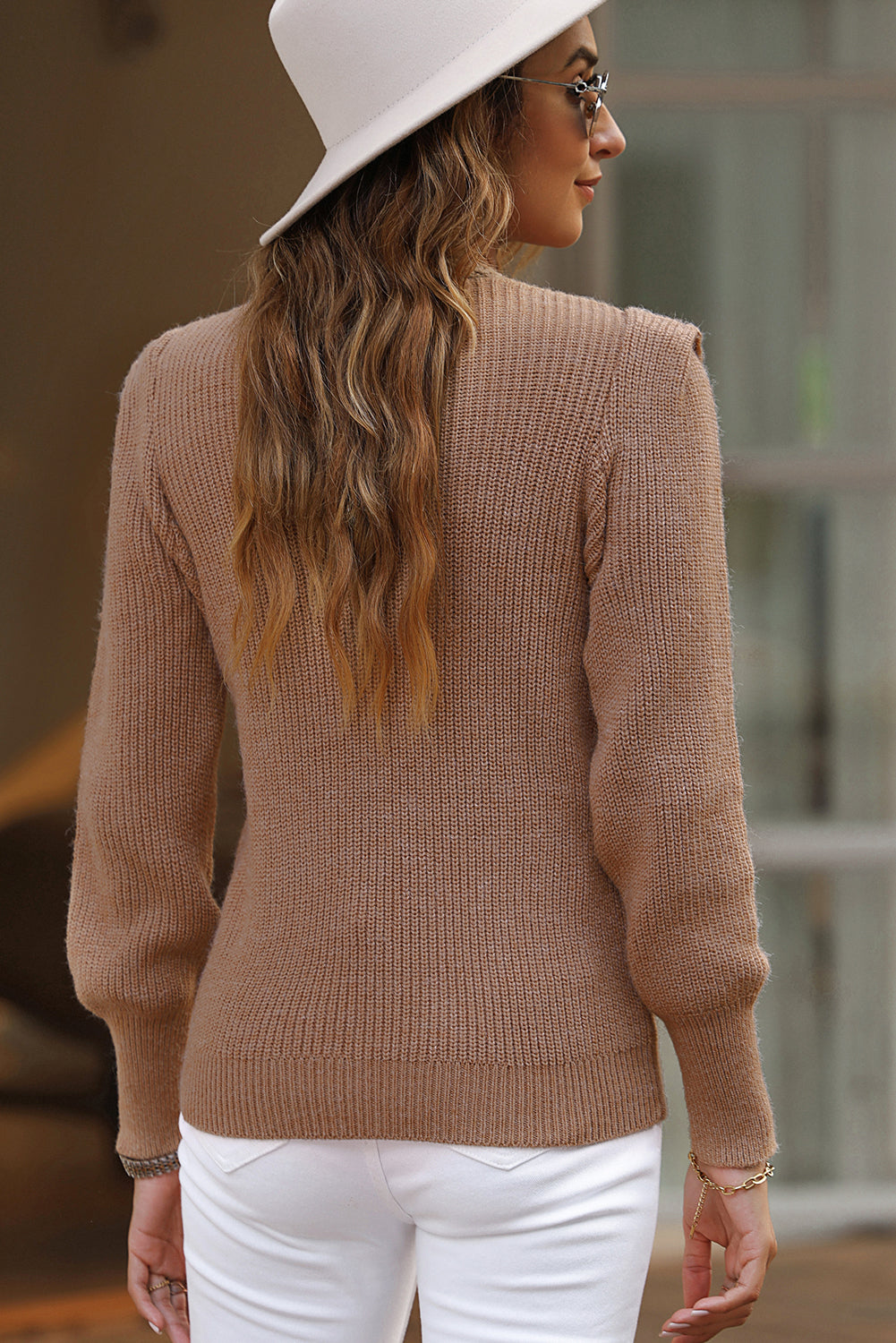 Brown braided knitted sweater with v-neck and puffed sleeves