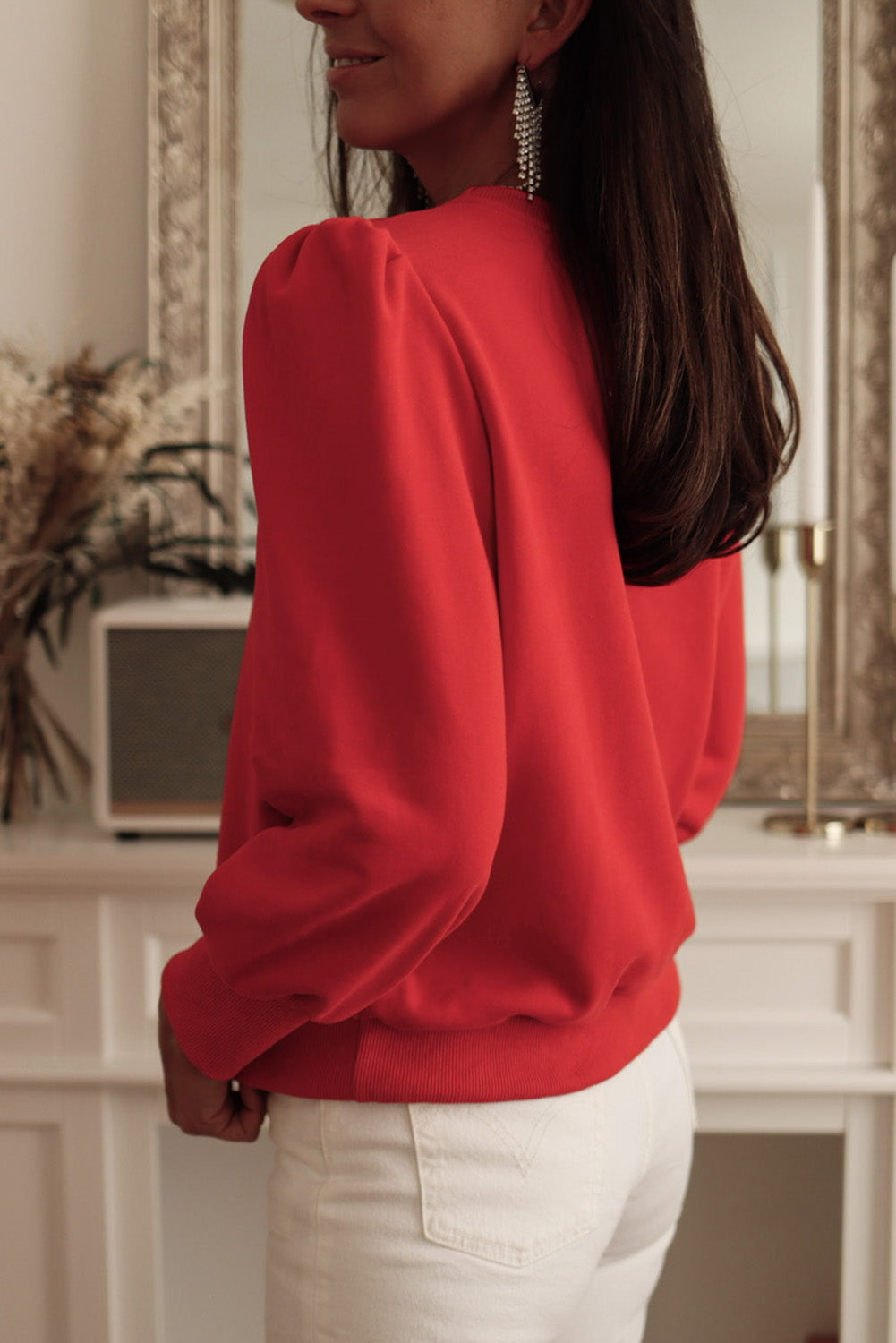 Bright red long sleeve top with button placket