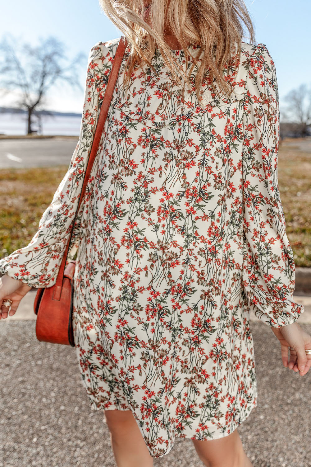 White long sleeve mini dress with floral print